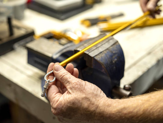 Re-stringing pole sections.